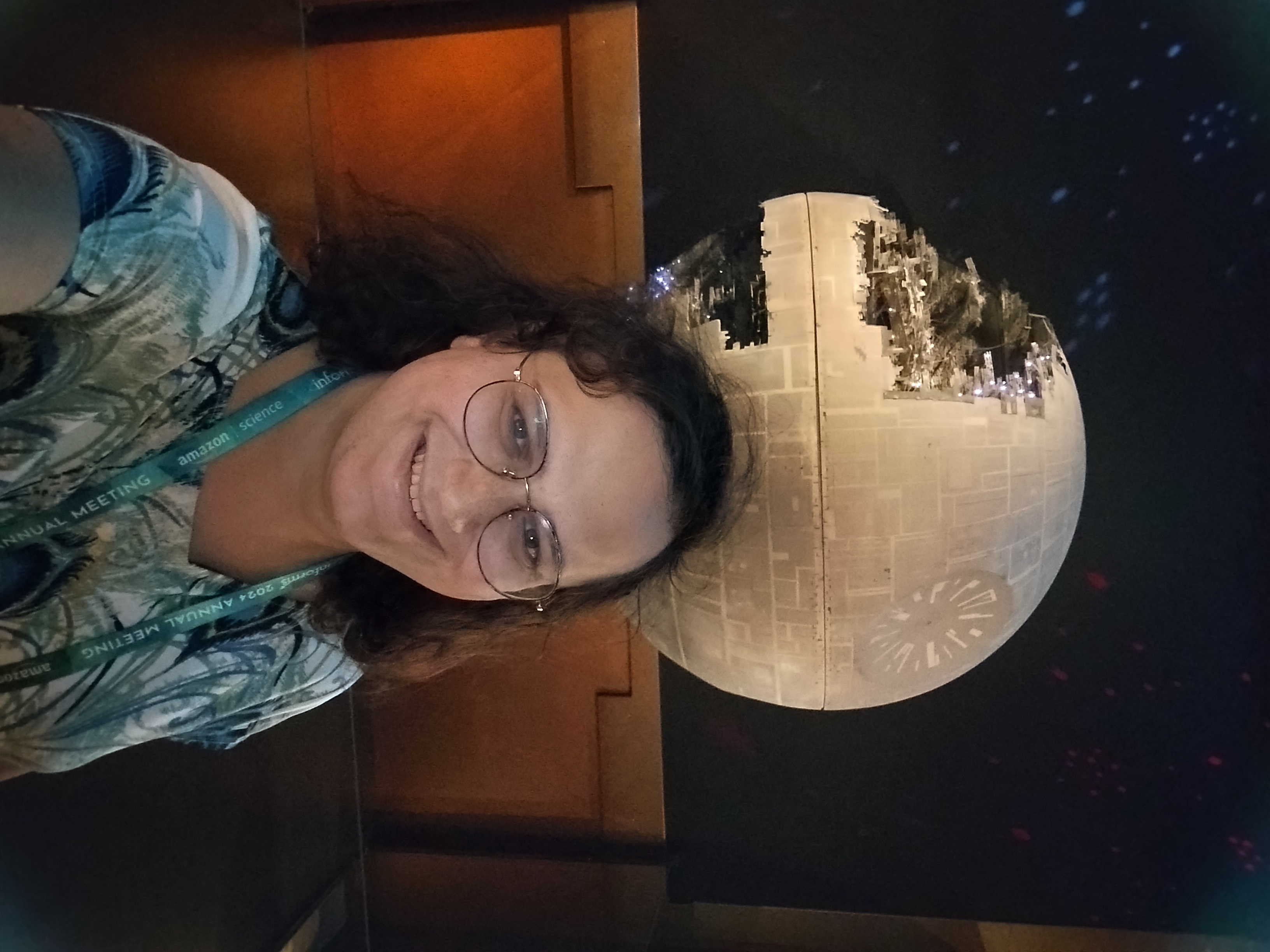 Me in front of the model of the Death Star under construction