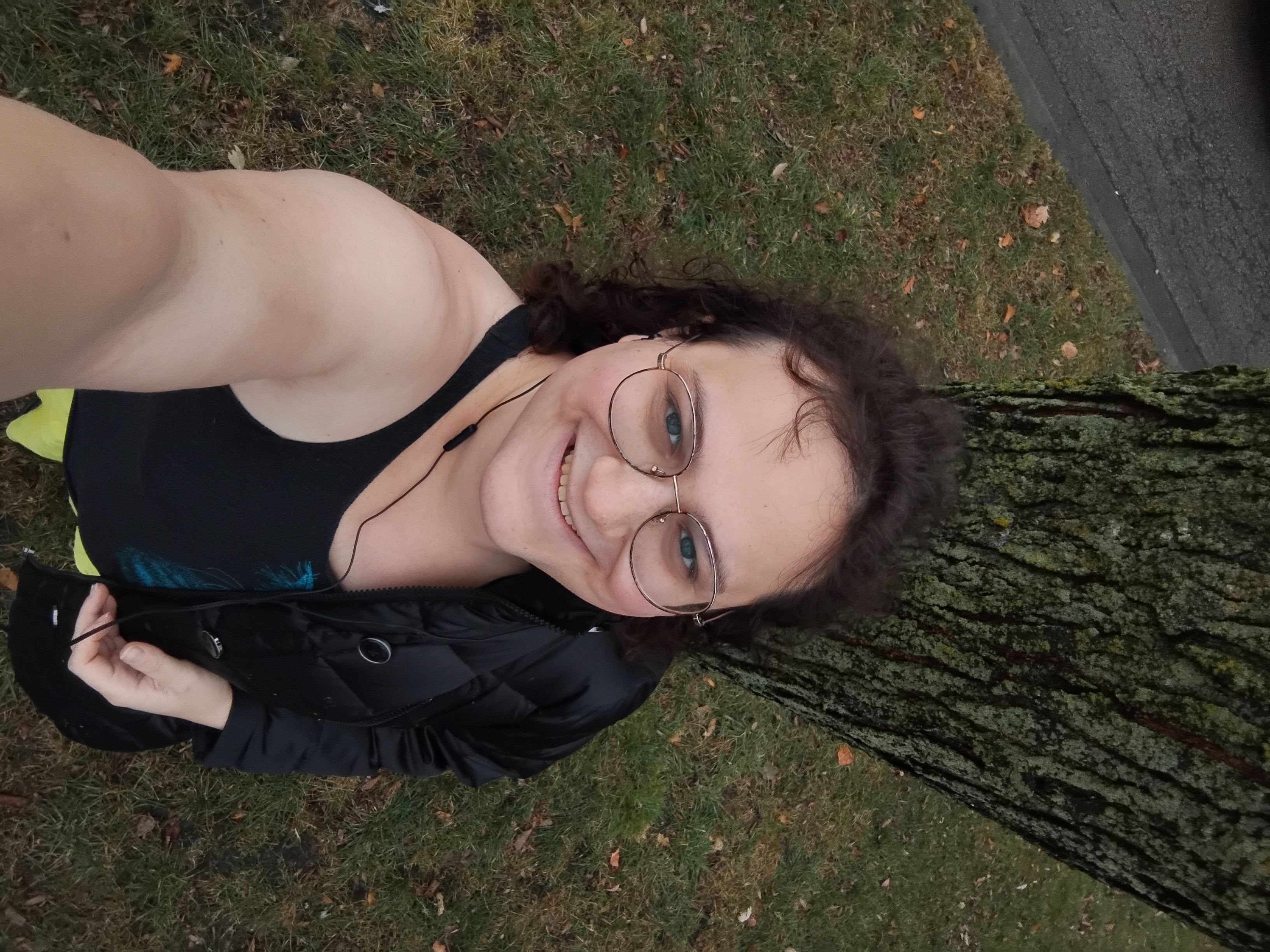 From above, in front of a tree, with my arm holding the camera visible.